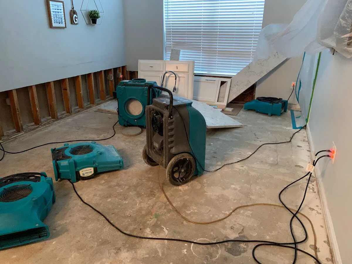 Dehumidifier in flood-cut room for Water Damage Restoration in Roeland Park